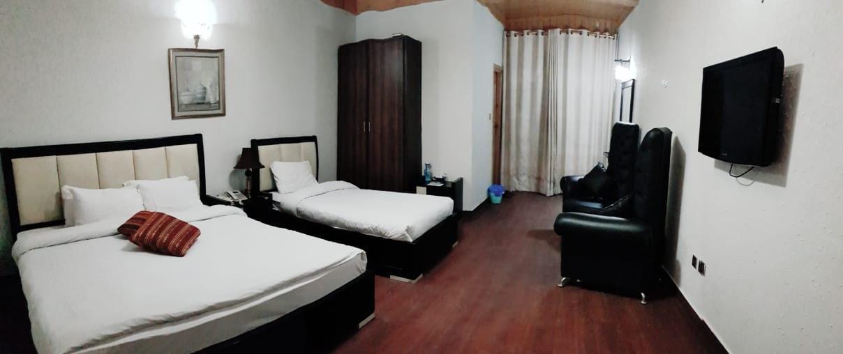 Rozefs Resorts - Naran hotel three bed room view from inside