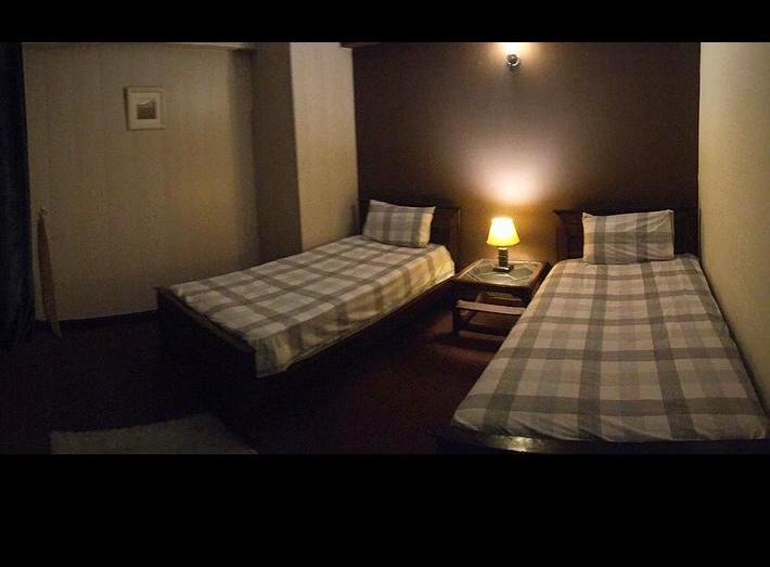 Beds in a guest house in Islamabad - Rozefs Tourism