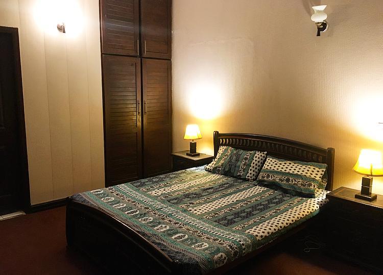 Double bed Bedroom of a guest house in Islamabad- Rozefs Tourism