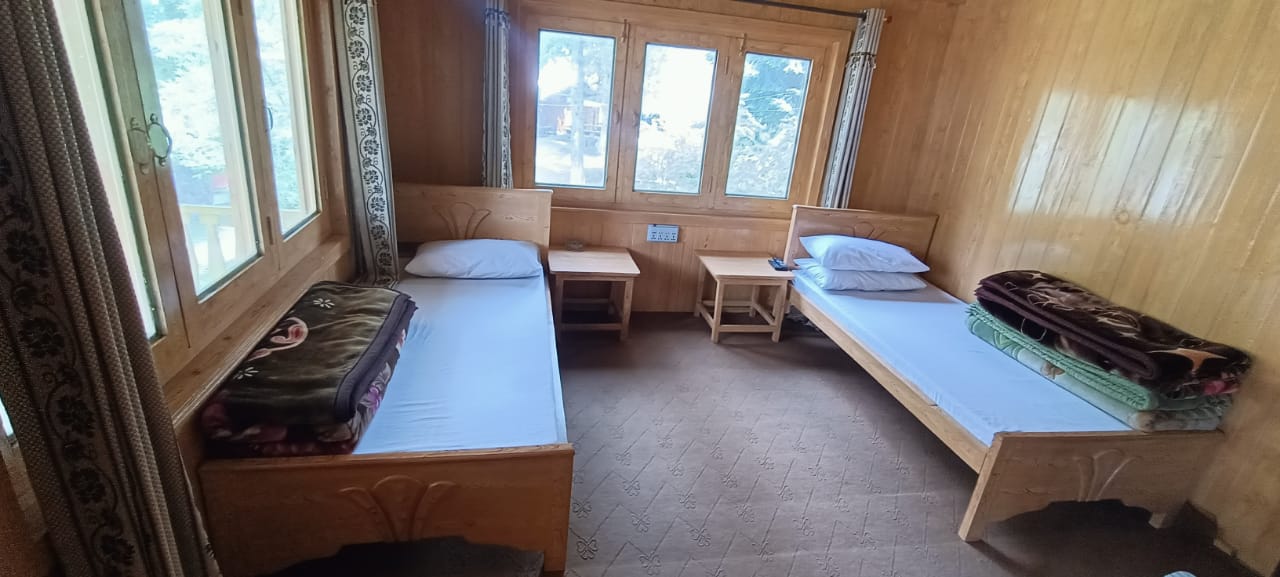 Hotel room with two beds in Tao Butt Neelum Valley