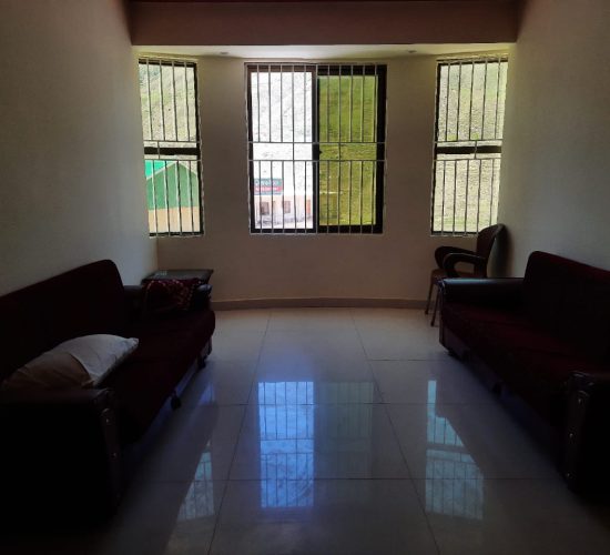 Lounge of twin sharing room for family in Batakundi